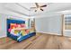 This spacious main bedroom features tray ceiling, ceiling fan, and natural light, offering a calm retreat at 3670 Cedar Springs Ln, Loganville, GA 30052