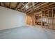 Spacious unfinished basement provides ample space for customization and finishing to taste at 4732 Corina Ne Pl, Roswell, GA 30075