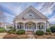 Charming clubhouse with a welcoming porch, perfect for community gatherings and events at 4732 Corina Ne Pl, Roswell, GA 30075