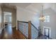 Grand foyer with hardwood floors, soaring ceilings, and an elegant chandelier at 4732 Corina Ne Pl, Roswell, GA 30075
