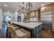 Spacious kitchen with large island, stainless steel appliances, and breakfast bar seating at 4732 Corina Ne Pl, Roswell, GA 30075