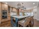 Modern kitchen featuring a large island, stainless steel appliances, and custom cabinetry at 4732 Corina Ne Pl, Roswell, GA 30075