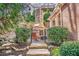 Cozy outdoor fireplace with seating area, ideal for entertaining guests or relaxing by the fire at 4732 Corina Ne Pl, Roswell, GA 30075