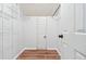 Spacious walk-in closet with wood-look flooring and plenty of hanging storage at 4974 Meadow Ln, Marietta, GA 30068
