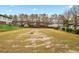 Open green space in a common area, with mature trees and landscaping at 4974 Meadow Ln, Marietta, GA 30068