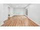 Spacious living room featuring hardwood floors and a glass door at 4974 Meadow Ln, Marietta, GA 30068