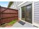 Cozy patio area with sliding door and a private wooden fence at 4974 Meadow Ln, Marietta, GA 30068