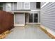 Cozy patio area with sliding glass door and privacy fence at 4974 Meadow Ln, Marietta, GA 30068
