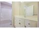 Bathroom featuring a white vanity and tub and shower combination at 6227 Braidwood Nw Way, Acworth, GA 30101