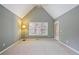 Bedroom with high ceilings, carpet, and windows at 6227 Braidwood Nw Way, Acworth, GA 30101