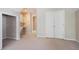 Neutral colored room with a door to the closet and bathroom at 6227 Braidwood Nw Way, Acworth, GA 30101