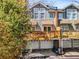 Townhouse with exterior deck, awnings, and garage parking at 1087 High Point Ne Dr, Atlanta, GA 30306