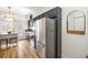 Bright kitchen features stainless steel fridge and appliances and eat-in bar area at 1087 High Point Ne Dr, Atlanta, GA 30306