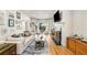 Elegant living room with fireplace, hardwood floors, and natural light for a relaxing retreat at 1087 High Point Ne Dr, Atlanta, GA 30306
