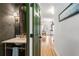 Charming powder room boasts marble countertop, stylish faucet, and a decorative mirror for added elegance at 1087 High Point Ne Dr, Atlanta, GA 30306
