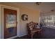 Relaxing covered front porch with bench seating for enjoying the outdoors at 165 Carriage Gate Dr, Sharpsburg, GA 30277
