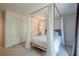Bright bedroom with a four poster bed, carpet floors, and a double door closet at 249 The South Chace Ne, Atlanta, GA 30328