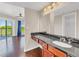 Stylish bathroom vanity with granite countertop near the bedroom and balcony at 275 13Th Ne St # 903, Atlanta, GA 30309