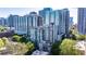 Condo building with balconies and views of the city skyline, offering a luxurious urban living experience at 275 13Th Ne St # 903, Atlanta, GA 30309