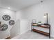 Well lit hallway with a table and decorations at 306 Oldvine Dr, Lawrenceville, GA 30044