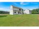 Newly built home with a large, green lawn and concrete patio perfect for outdoor enjoyment at 376 Waterbluff Dr, Mableton, GA 30126
