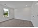 Bedroom featuring plush carpets, recessed lighting, and a window at 376 Waterbluff Dr, Mableton, GA 30126