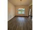 Dining room featuring modern chandelier and view of front yard at 376 Waterbluff Dr, Mableton, GA 30126