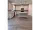 Open kitchen with granite countertops, stainless steel appliances, and a kitchen island at 376 Waterbluff Dr, Mableton, GA 30126