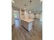 Open kitchen island has granite countertops and storage space in the cabinets below at 376 Waterbluff Dr, Mableton, GA 30126