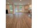 Bright living area with backyard view and open layout to kitchen area at 376 Waterbluff Dr, Mableton, GA 30126