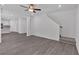 Open-concept living room offers contemporary finishes and a modern staircase nearby at 376 Waterbluff Dr, Mableton, GA 30126