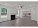 Living room featuring ample natural light, fireplace and open floor concept at 376 Waterbluff Dr, Mableton, GA 30126