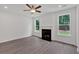 Living room with bright natural light and a modern fireplace at 376 Waterbluff Dr, Mableton, GA 30126