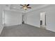 Spacious main bedroom with large closet doors, ceiling fan, and plenty of natural light at 376 Waterbluff Dr, Mableton, GA 30126