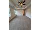 Spacious carpeted main bedroom features trey ceilings and windows at 376 Waterbluff Dr, Mableton, GA 30126