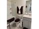 Well-appointed bathroom with a shower-tub combo and coordinated brown accessories at 1302 Speckle Park Way, Stockbridge, GA 30281