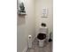 Cozy bathroom area with stylish decor, featuring a modern toilet and fixtures at 1302 Speckle Park Way, Stockbridge, GA 30281