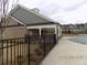 Charming pool house with stone accents and covered area near the community pool at 1302 Speckle Park Way, Stockbridge, GA 30281