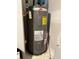 Classic Rheem water heater showing labels, fittings, and pipes in a utility space at 1302 Speckle Park Way, Stockbridge, GA 30281