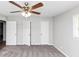 Bedroom features ceiling fan and new carpet at 1507 Fair Haven Dr, Riverdale, GA 30296