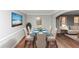 Elegant dining room featuring ample seating, natural light, and modern decor at 1507 Fair Haven Dr, Riverdale, GA 30296