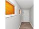 Inviting hallway with modern flooring and neutral paint at 1507 Fair Haven Dr, Riverdale, GA 30296