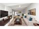 Cozy living room with painted fireplace, modern furniture and decor at 1507 Fair Haven Dr, Riverdale, GA 30296