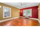 Spacious bedroom with hardwood floors, a ceiling fan, and lots of natural light at 2265 E Lake Ne Rd, Atlanta, GA 30307