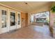 Inviting front porch with tile flooring and a cozy swing at 2265 E Lake Ne Rd, Atlanta, GA 30307