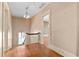 Second floor hallway with wooden floors, natural light, and a view of the staircase at 2265 E Lake Ne Rd, Atlanta, GA 30307