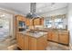 Modern kitchen with stainless steel appliances, granite countertops, and a center island cooktop at 2265 E Lake Ne Rd, Atlanta, GA 30307