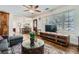 Stylish living room with hardwood floors, and seamlessly connects to the adjacent dining area at 2836 Waters Sw Rd, Atlanta, GA 30354