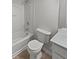 Clean, well-maintained bathroom featuring a shower-tub combo and modern fixtures at 3905 Delfaire Trce, Cumming, GA 30040