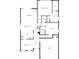 Downstairs floor plan featuring living room, kitchen, dining area, and garage at 3905 Delfaire Trce, Cumming, GA 30040